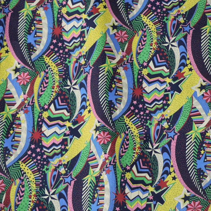 Blue floral print cotton fabric showing botanical designs on 145cm wide material