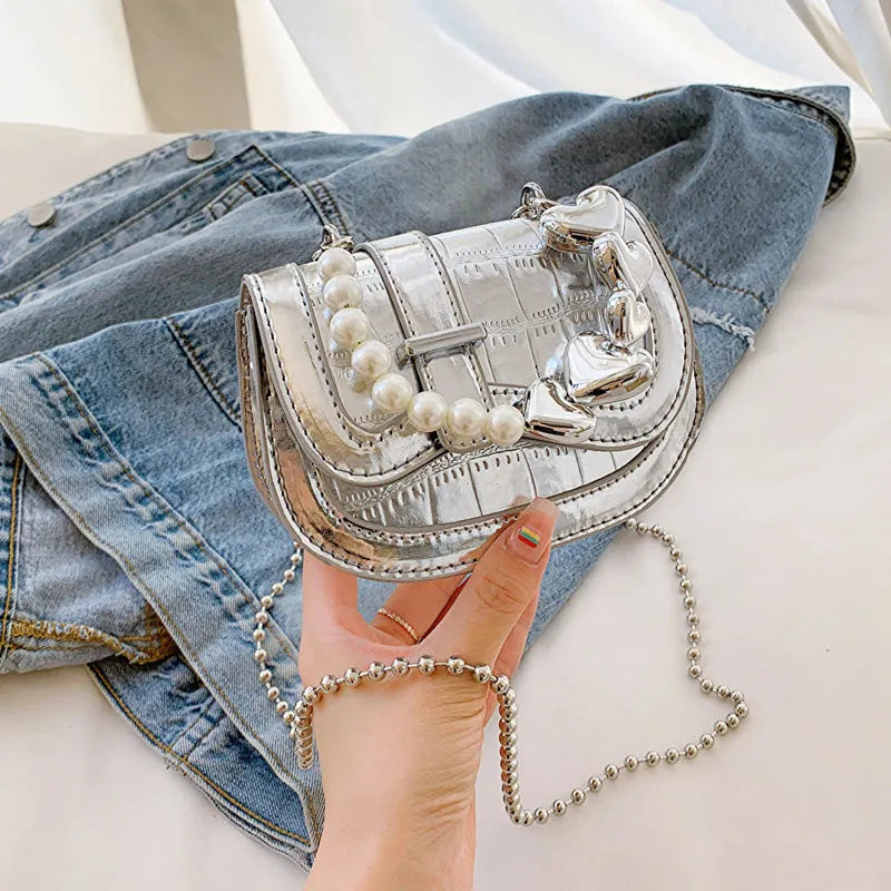 Women's silver PU leather mini tote saddle crossbody bag with single strap and outer pocket