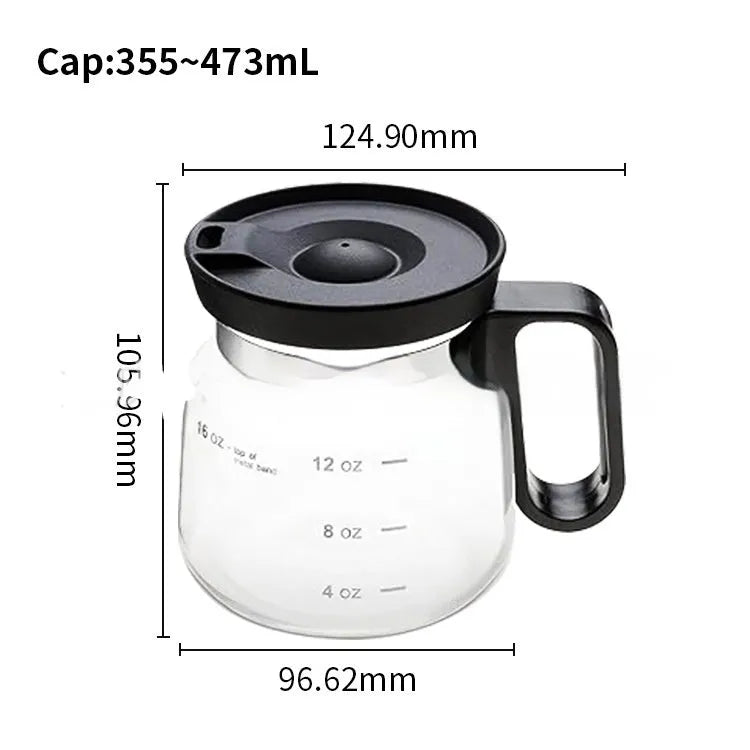 Transparent borosilicate glass coffee maker with black silicone cover on a kitchen counter