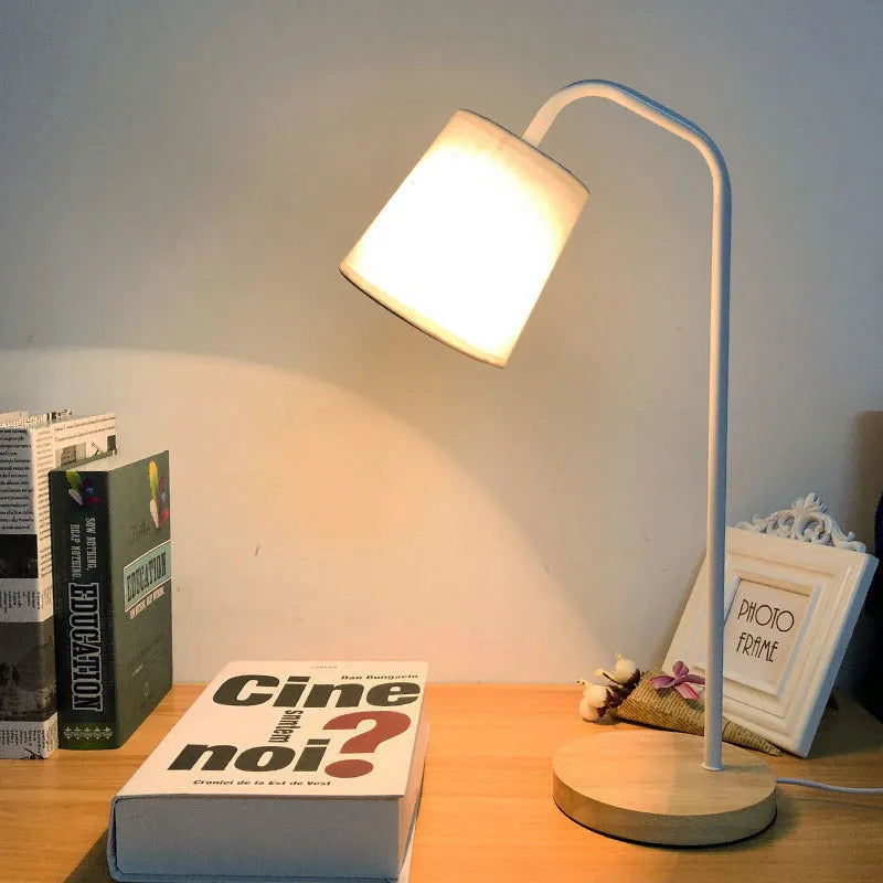 Nordic style desk lamp with dimmer switch in white finish on wooden desk