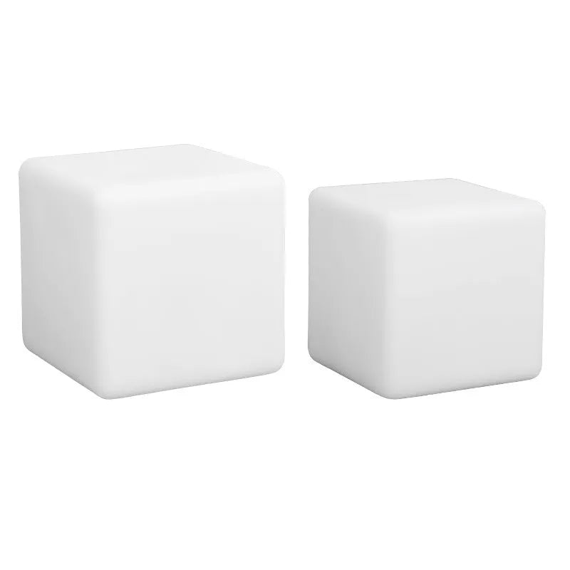 Small square night light showing seven colour changing modes, with remote control.