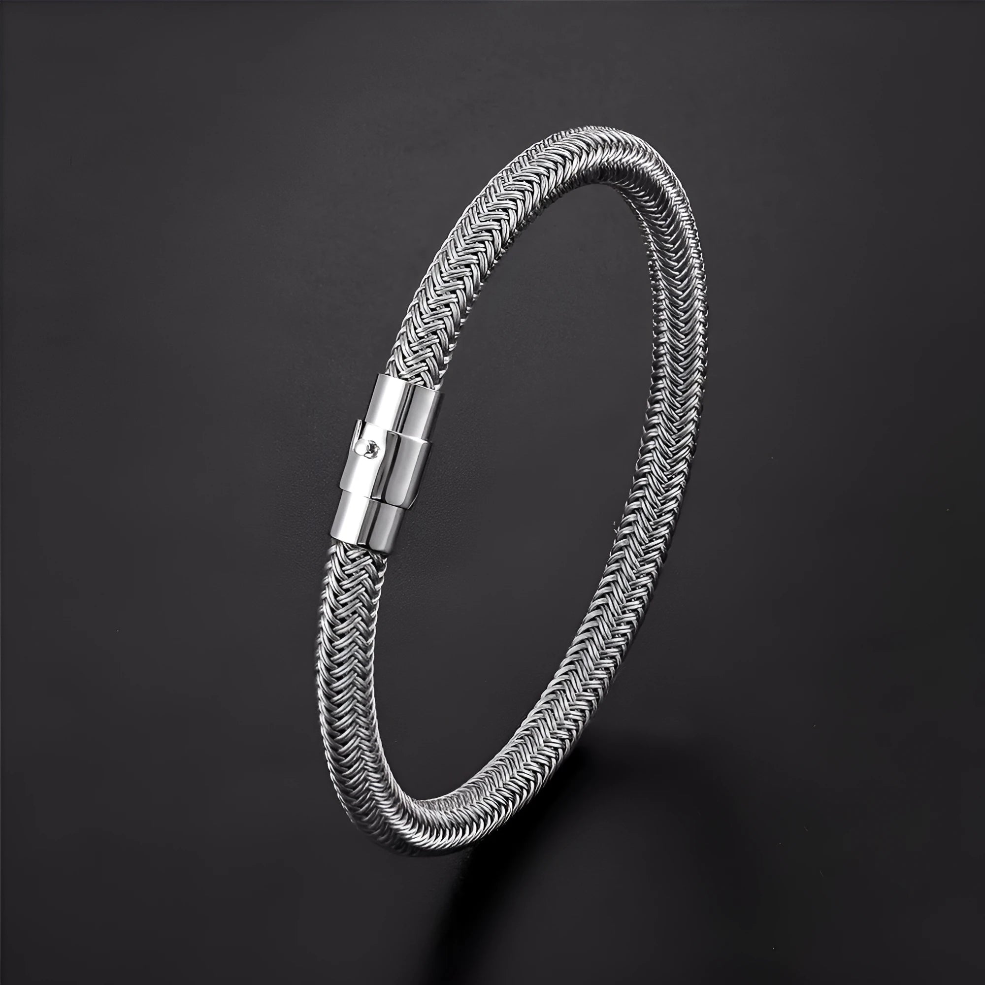 Titanium steel wire bracelet with magnetic clasp in a geometric, unisex design.