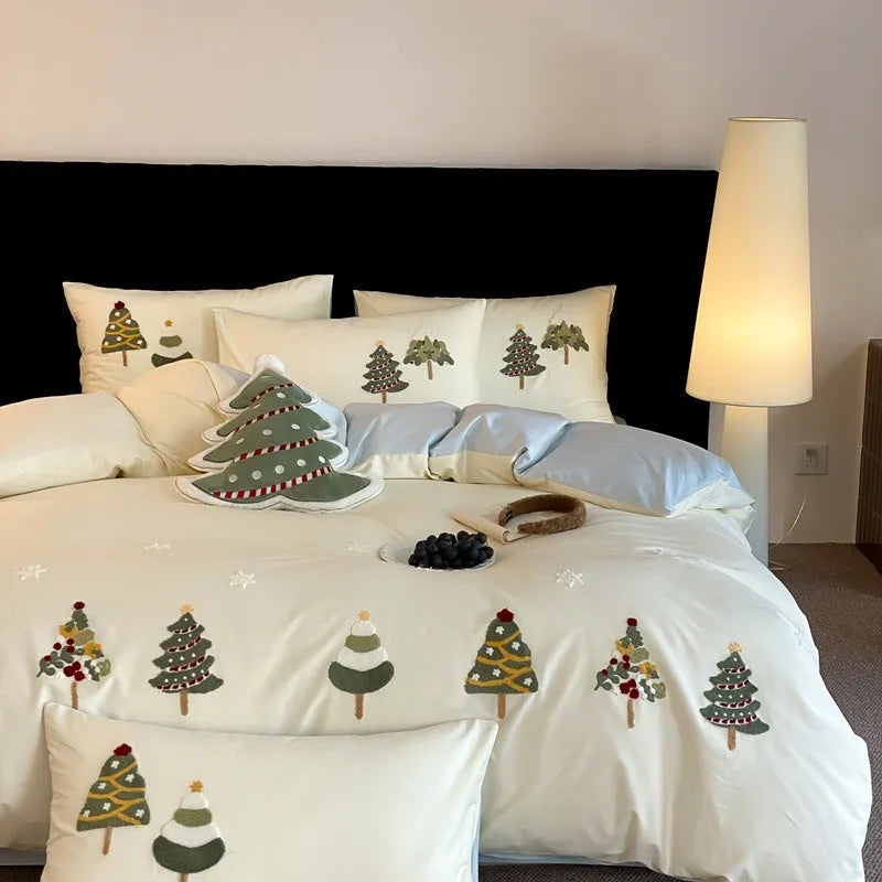 Pure cotton four-piece bedding set with embroidered Christmas tree pattern showing duvet cover, bed sheet and pillowcases