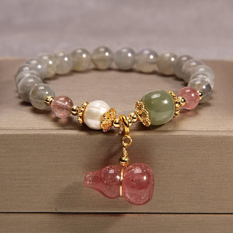 Women's multi-layer crystal bracelet with natural garnet, strawberry quartz, and moonstone pendants in Korean style.