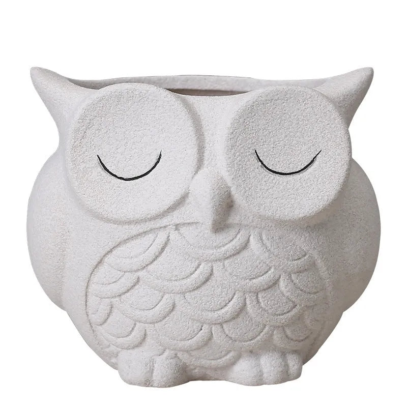 Handmade frosted ceramic owl pot for succulents in light pink, dimensions 11x9x9 cm.