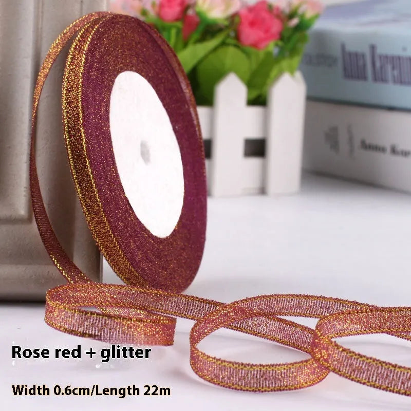 Roll of 0.6cm wide coloured polyester gift ribbon with 22 metre length.