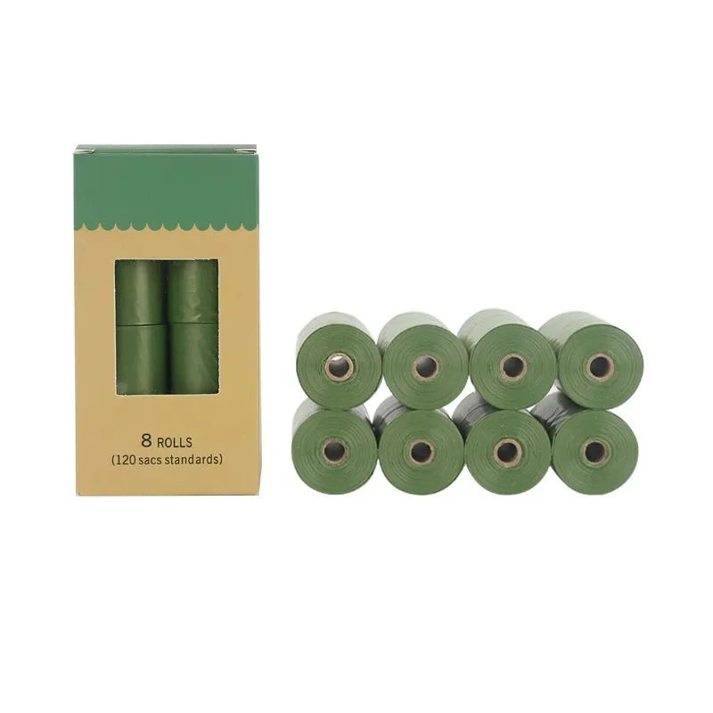 Rolls of green, black, blue, purple and orange degradable pet poo bags with a portable dispenser