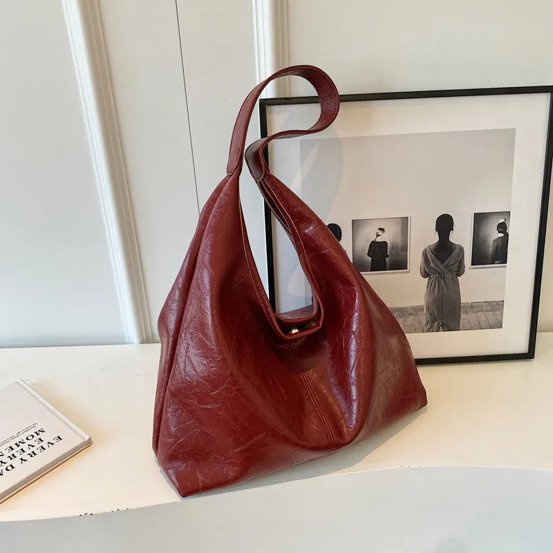 Soft PU leather casual shoulder bag with large capacity and street style design