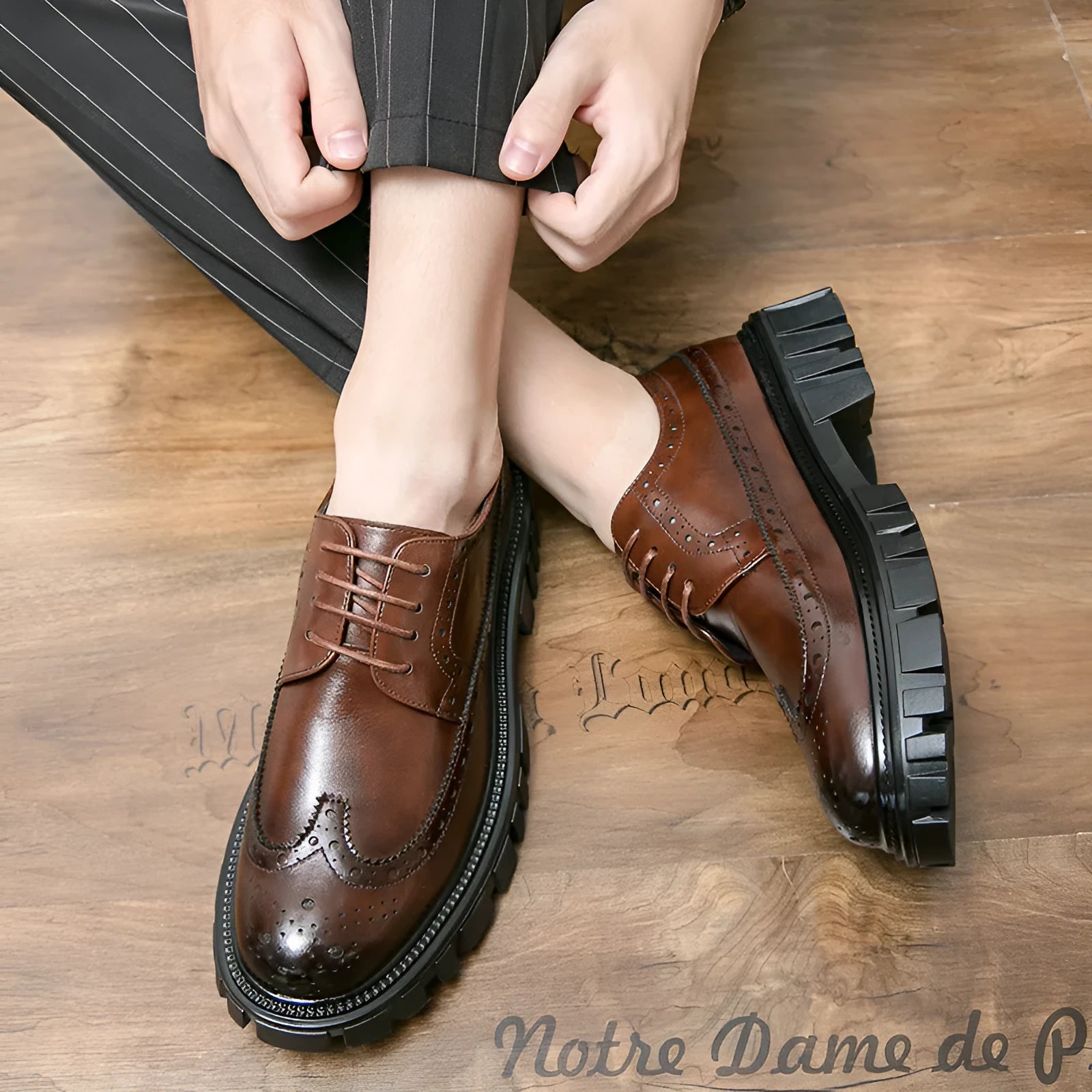 Men's black and brown artificial PU leather brogue business shoes with round toe.