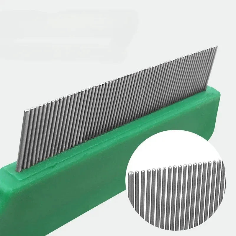 Green plastic-handled pet flea comb with stainless steel pins for dog and cat grooming