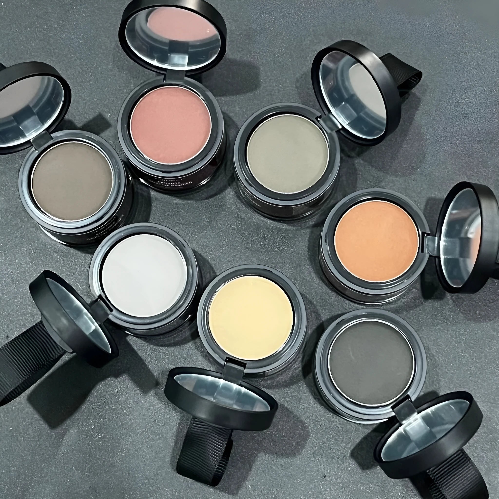 Hairline powder compact for shadow repair with fourteen colour shade options