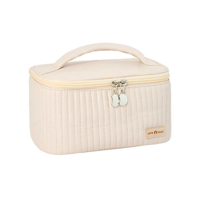 Open-top PU leather makeup bag in a choice of six solid colours including pink, coffee, and light blue.