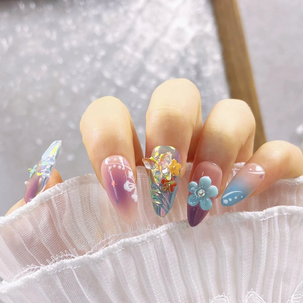 Handmade colourful nail sculpture set with small flower and butterfly designs in four sizes