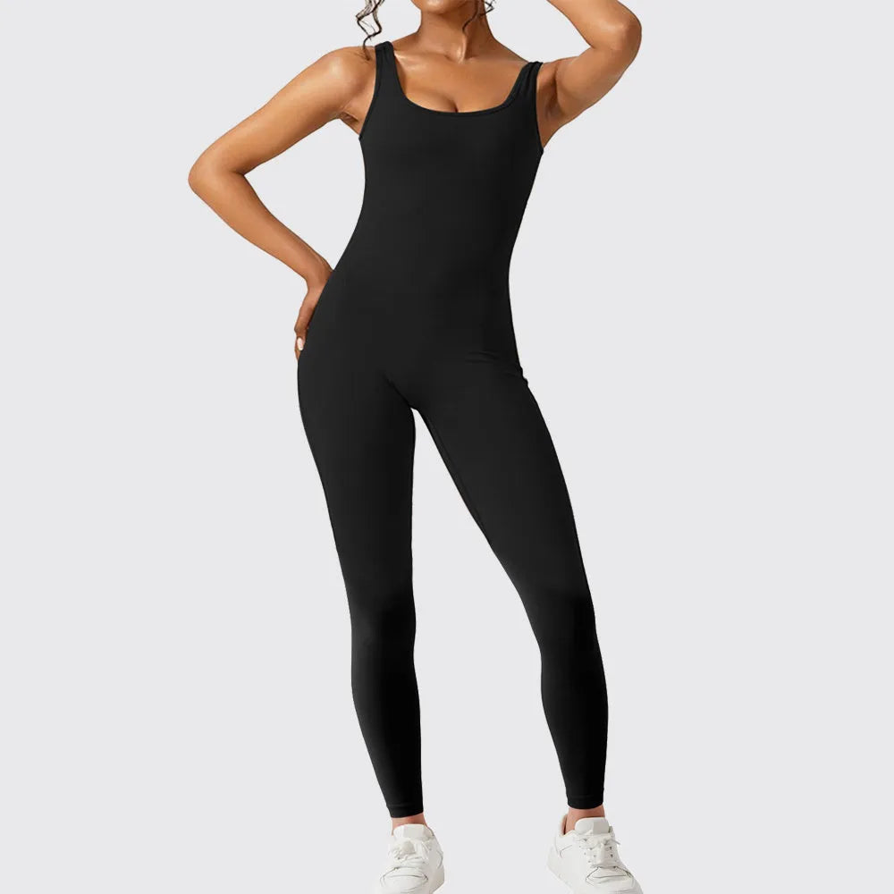 Women's sleeveless flare jumpsuit for yoga and fitness in high-elasticity polyester fabric.