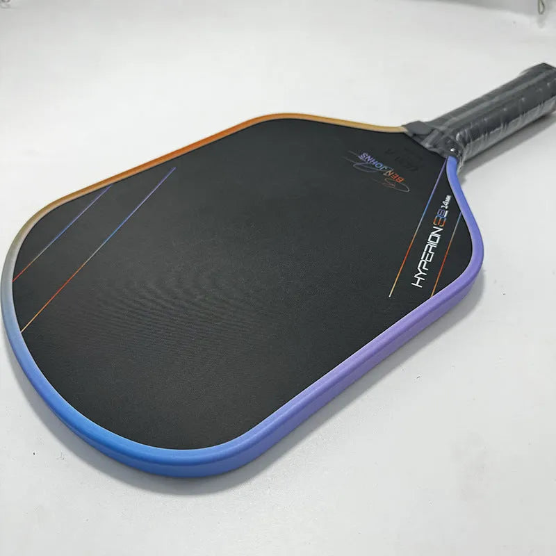 Aurora multicolour T700 carbon fibre pickleball racket with matte finish and honeycomb core.