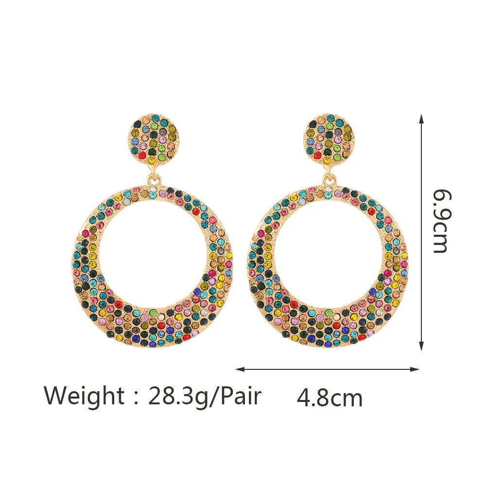 Large round pendant earrings with colourful diamond cartoon designs on metal alloy