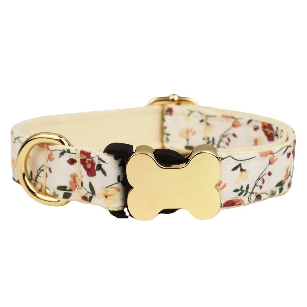 Flat nylon dog collar with a printed grid pattern and a silver bone-shaped metal buckle on a white background.