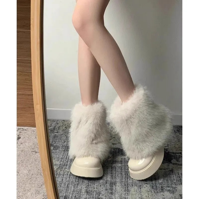 Women's low top snow boots with artificial plush construction and waterproof rubber sole