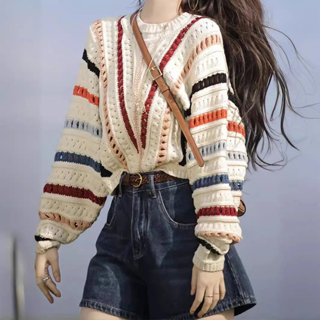 Colourful rainbow striped loose-fitting sweater with batwing sleeves and round neck
