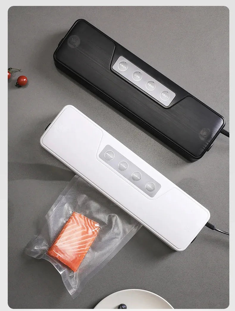 Compact white automatic vacuum sealer machine for household food preservation and item storage