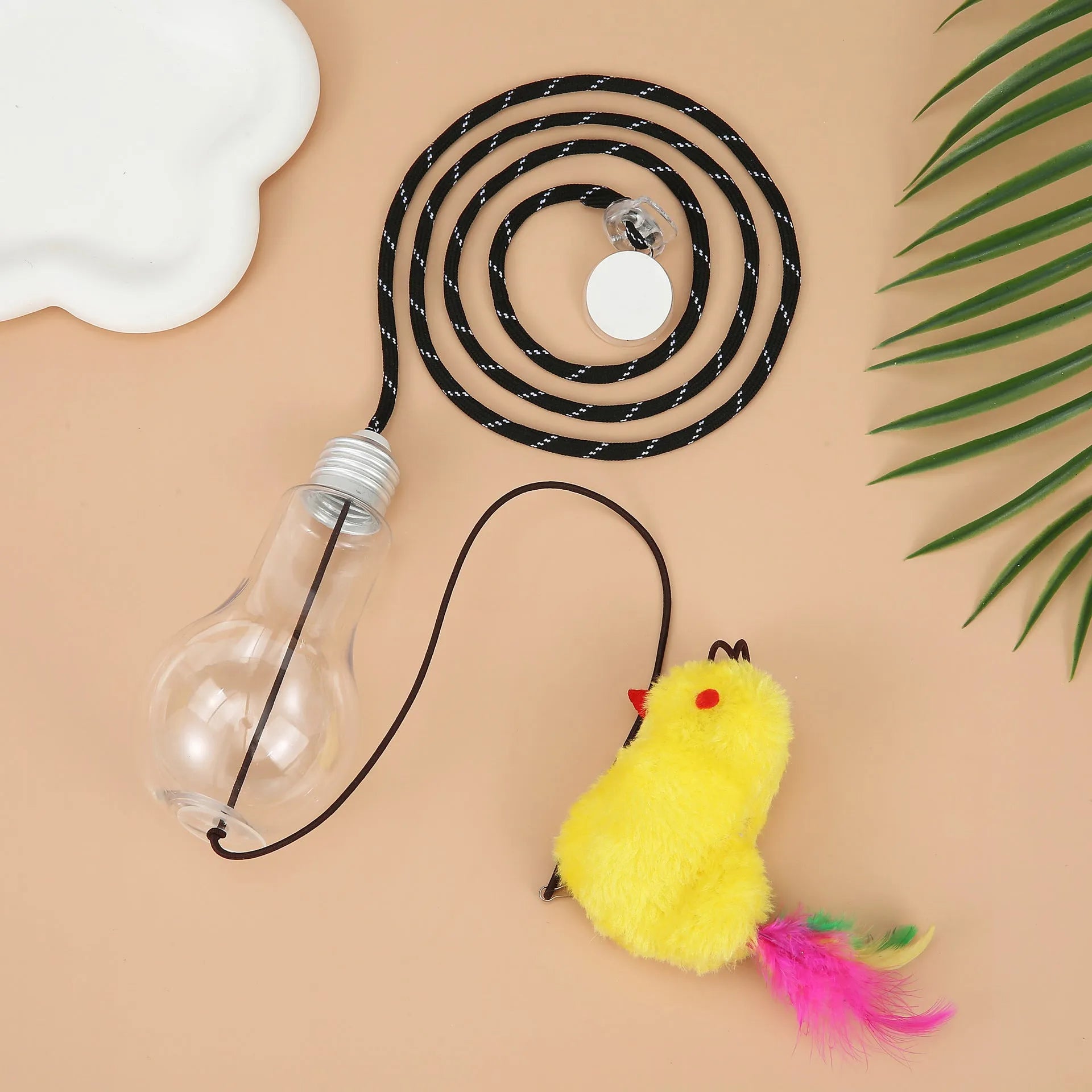 Grey and yellow hanging cat toy with elastic rope, dangling mouse attachment, and treat dispenser bulb