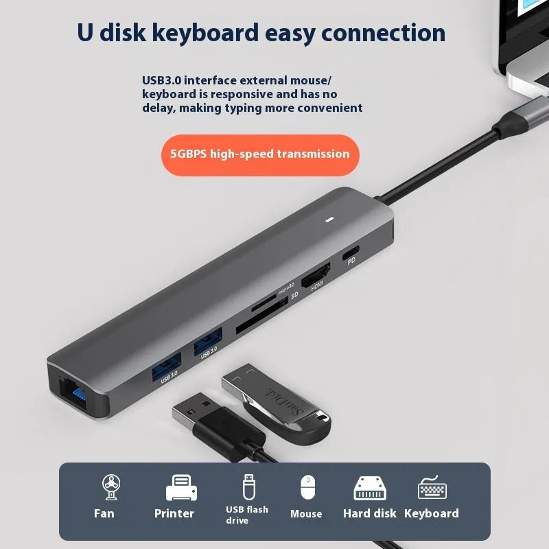 7-in-1 card reader and USB hub for laptops with multiple interface ports