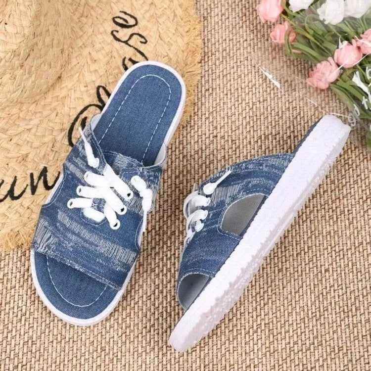 Blue Roman-style women's canvas slippers with rubber sole and cloth lining