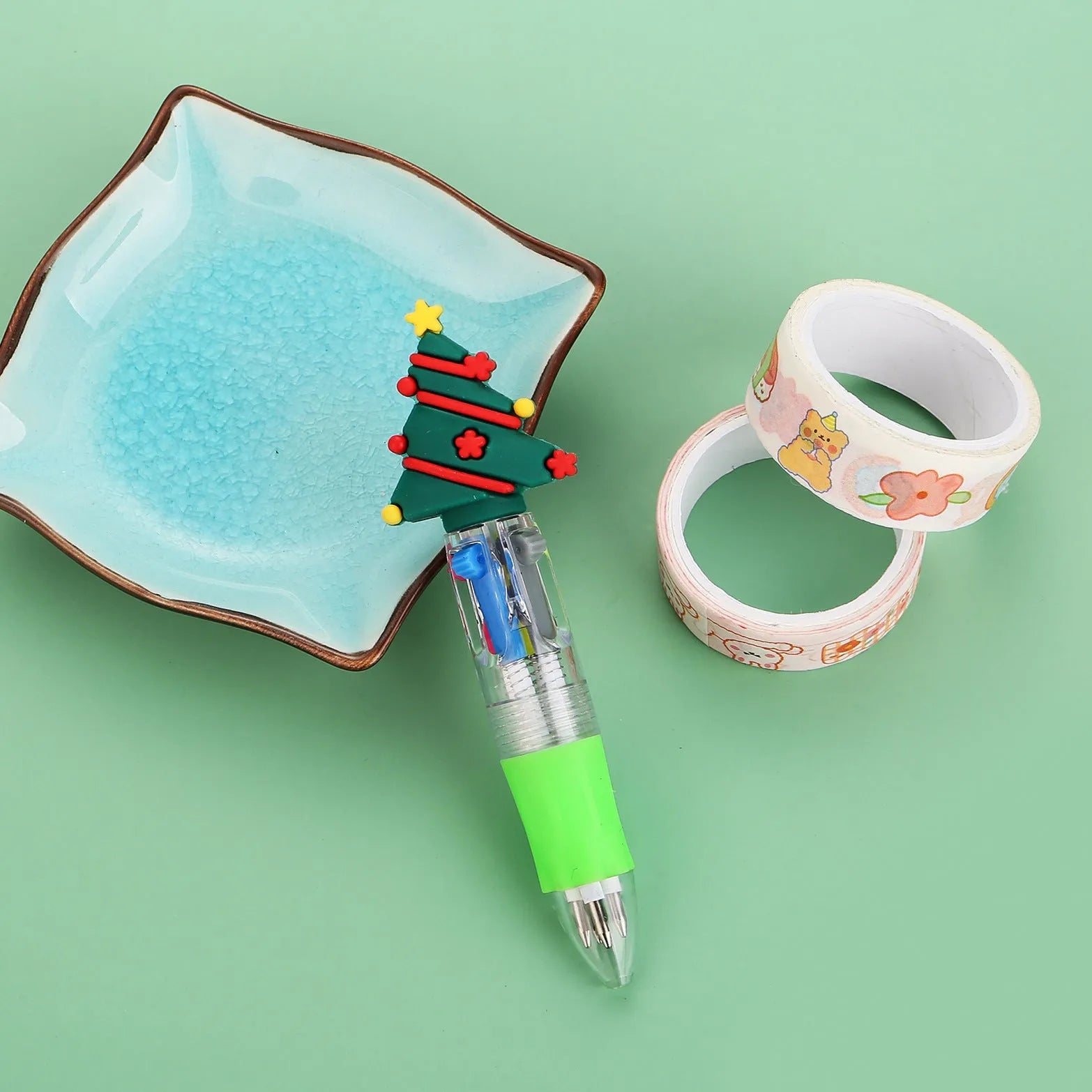Compact 11cm Christmas four-colour ballpoint pen with press mechanism in festive designs