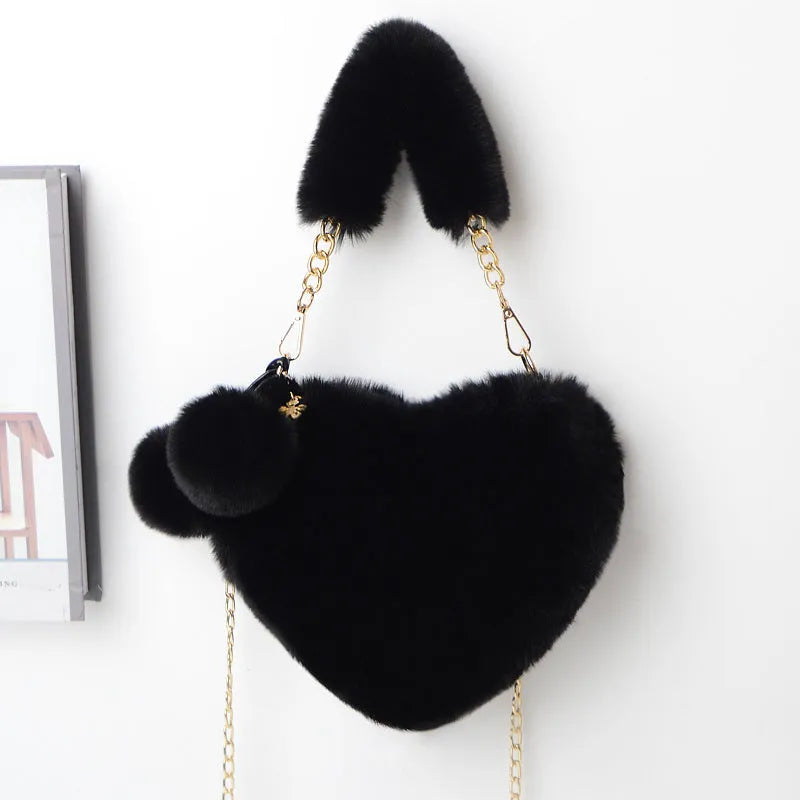 Soft plush heart-shaped women's handbag in medium size with zipper closure