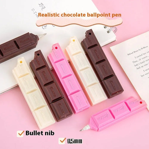 Chocolate ballpoint pen with cartoon food design in pink, beige, and brown colours