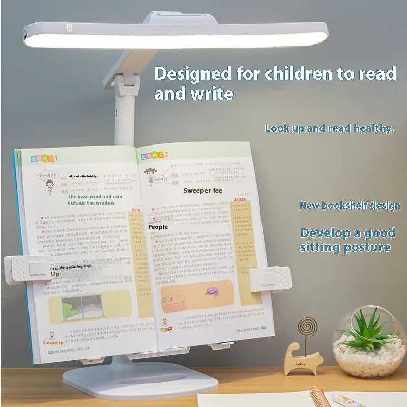 A white adjustable table lamp on a bookshelf with a flexible arm, showing a reading light in use.