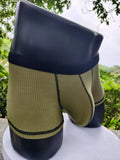 Solid colour men's boxers on a white background, showing thin breathable fabric and body-shaping fit.