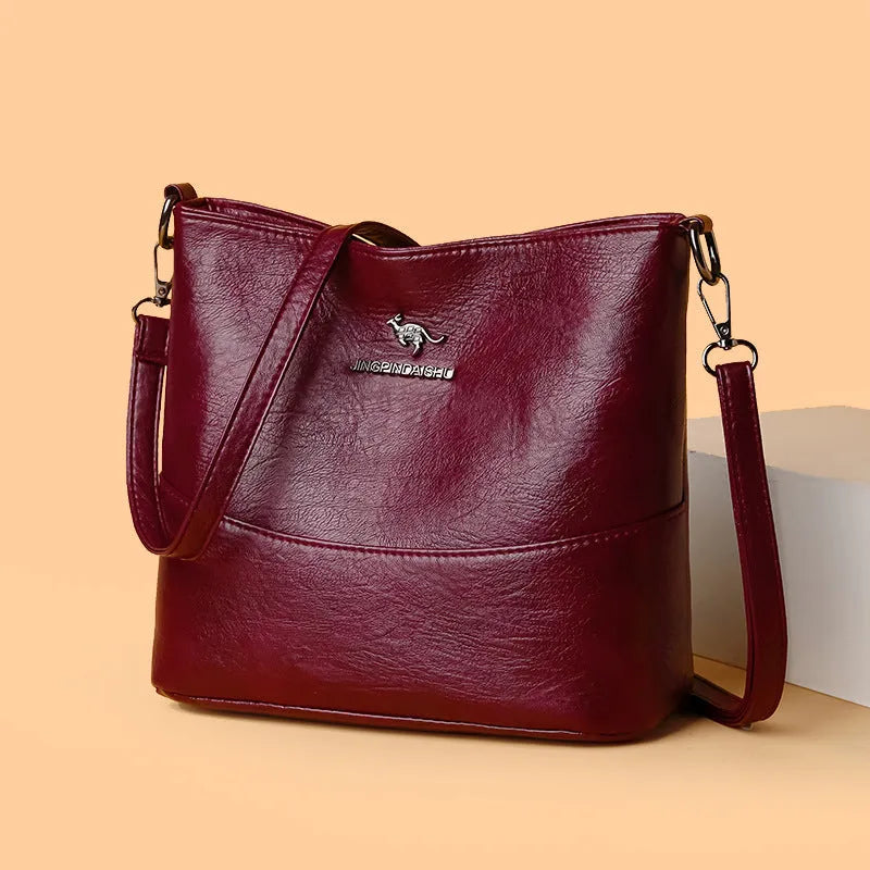Women's large capacity soft leather shoulder bag in bucket style with sandwich pocket