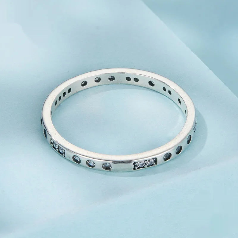 Moss Password I Love You silver ring with oxidised black finish, shown in size 7 on a model finger.
