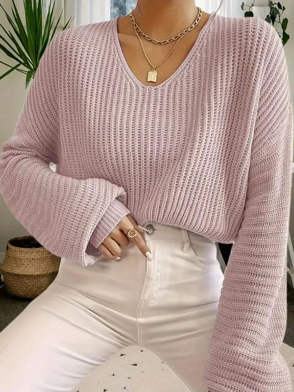 Women's solid colour long sleeve loose pullover in black, pink, green, blue, or red.