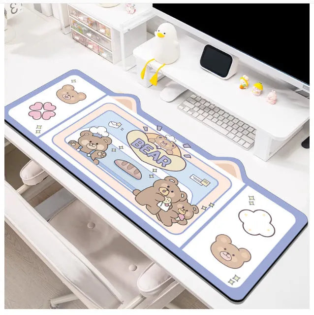 Oversized natural rubber desk mouse pad in a solid colour, shown on a workspace.