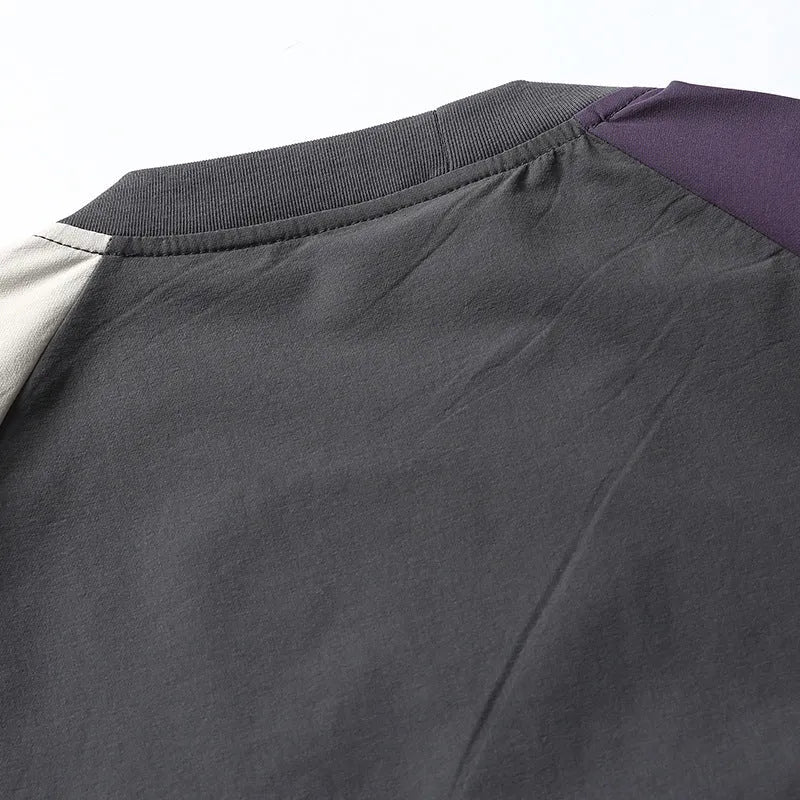 Dark grey men's t-shirt with contrast raglan sleeves in loose fit casual style