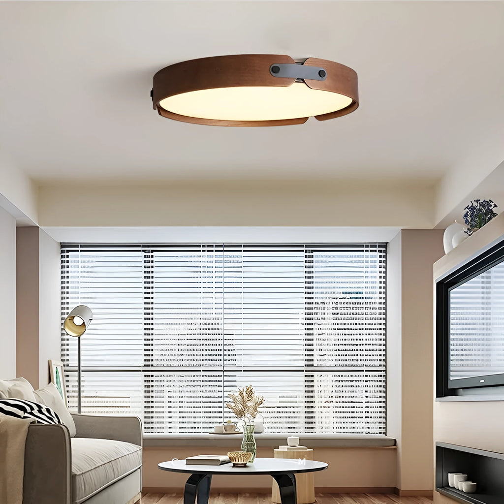 Japanese style wooden ceiling lamp with a round PMMA lampshade in warm light colour.