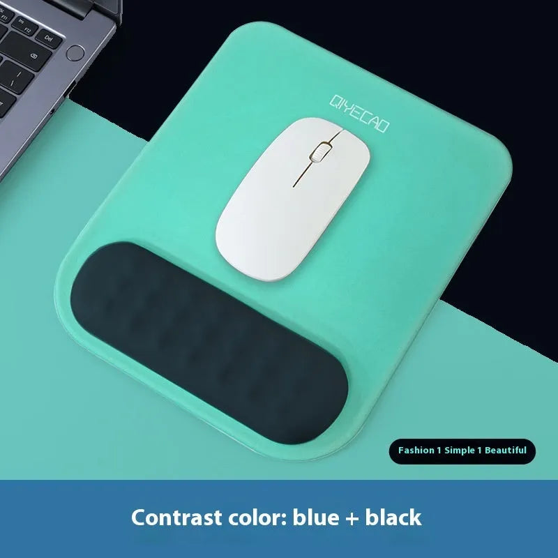 Ergonomic cloth silicone mouse pad with raised wrist support in mint green colour.