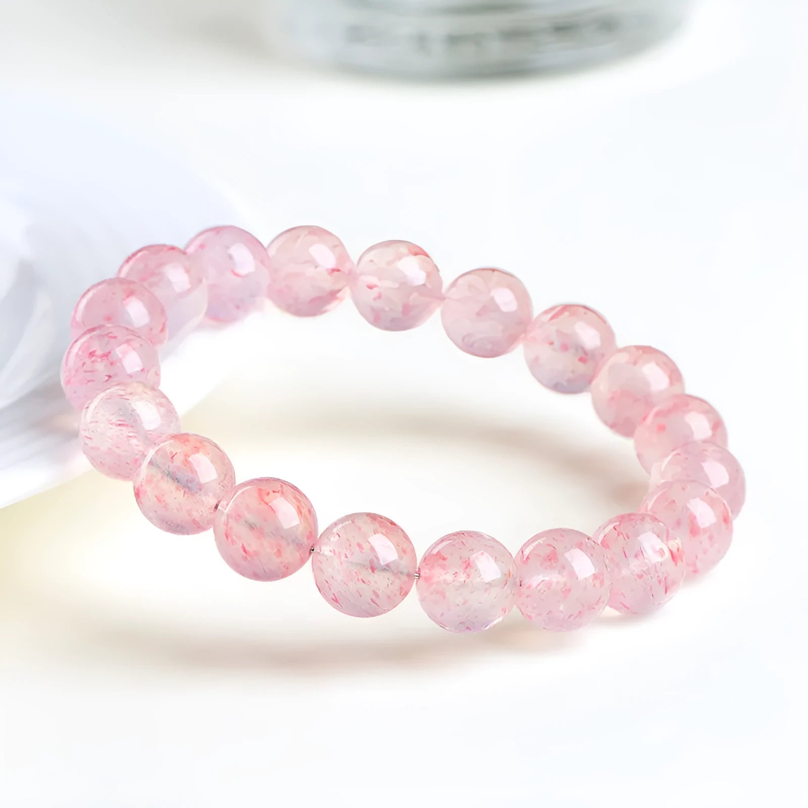 Strawberry quartz crystal bracelet with 10mm round beads and ground finish