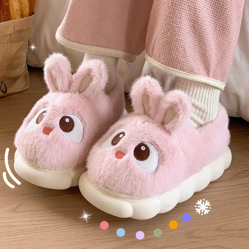 Female cartoon ankle wrap thermal cotton slippers in pink, blue, and gray options with suede upper and non-slip PVC sole