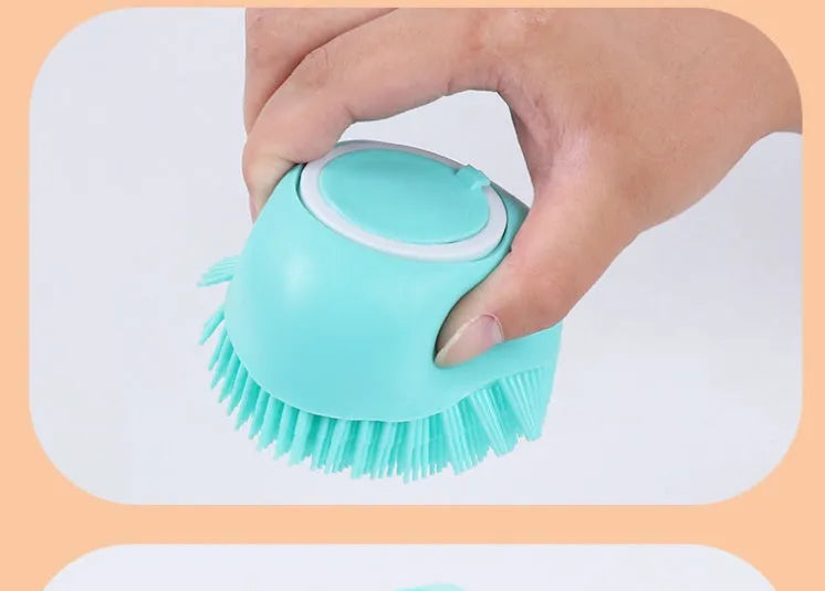 Blue silicone dog bath brush with handle for pet washing and massage during grooming