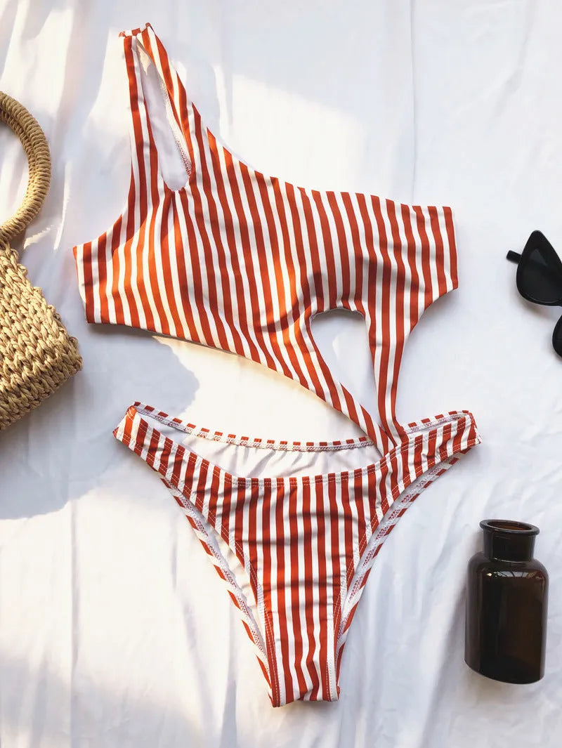 One-piece swimsuit for women with chest pad in black or pink stripes and solid colours