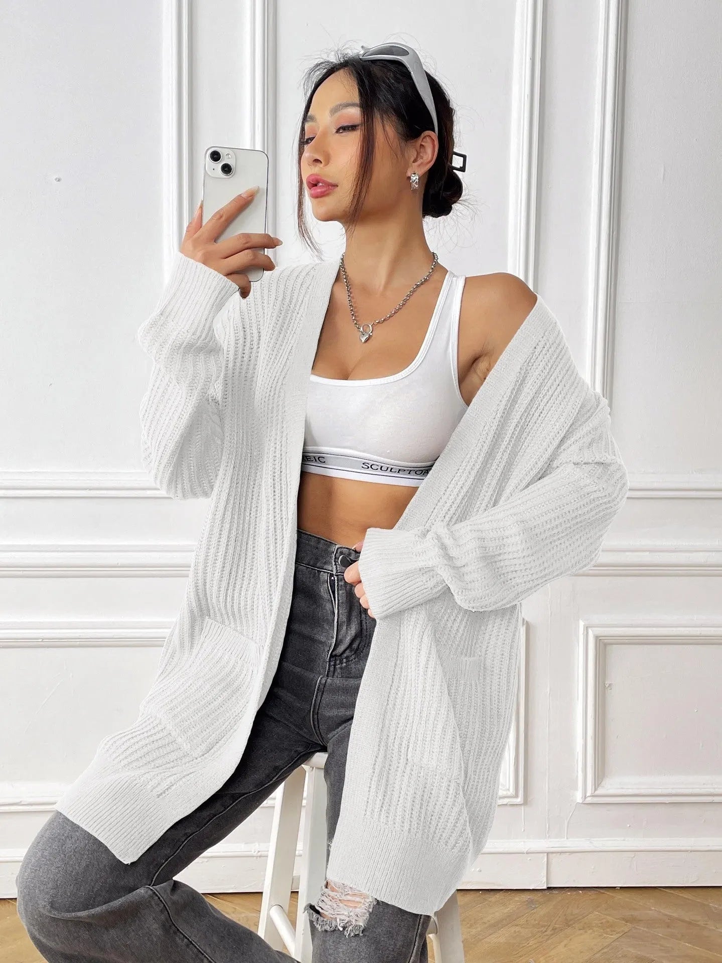 Women's mid-length loose fit cardigan with double pockets in dark green colour