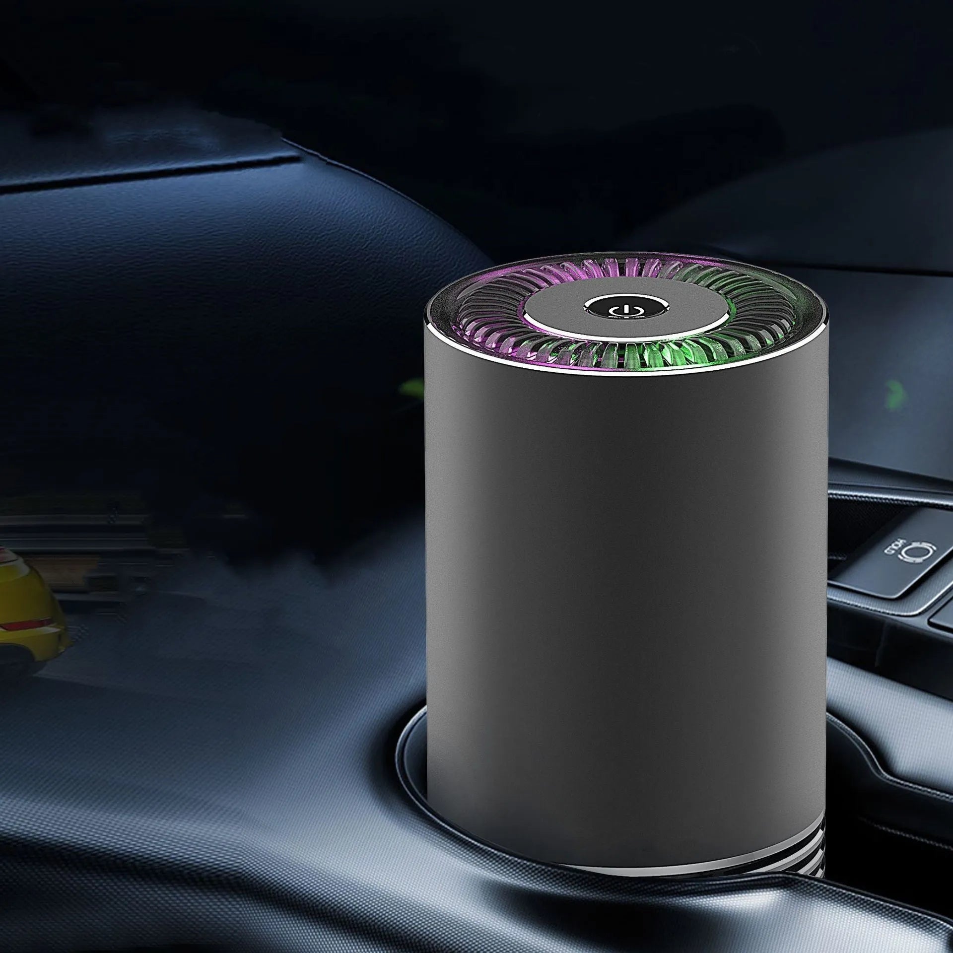 Compact wireless car air purifier in aluminium alloy and ABS, shown in black, silver, and metallic grey.