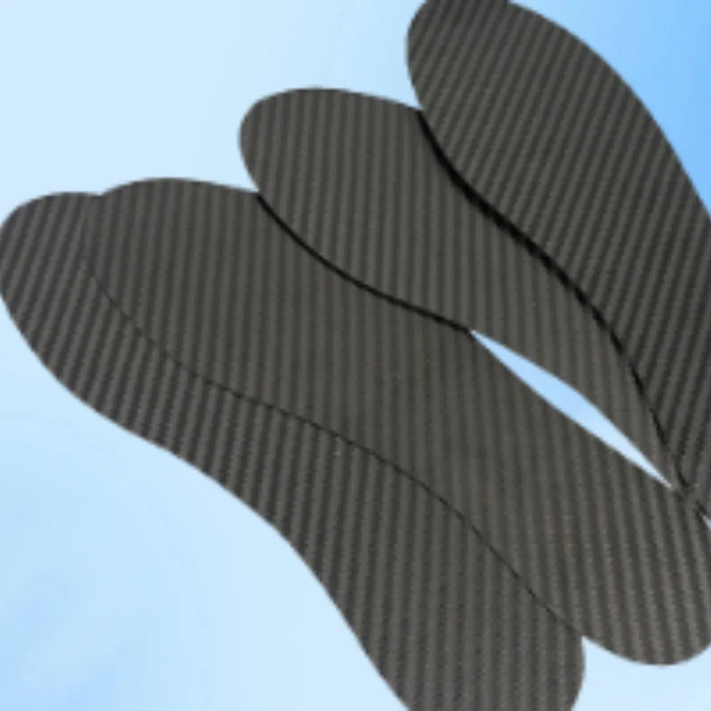 Black 3K carbon fibre running shoe insole shown from above, highlighting its woven texture.