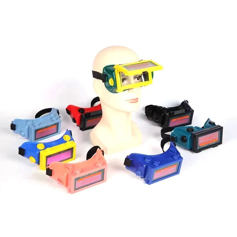 Light-changing electric welding glasses head-mounted type in green with flip dimmer and protective films