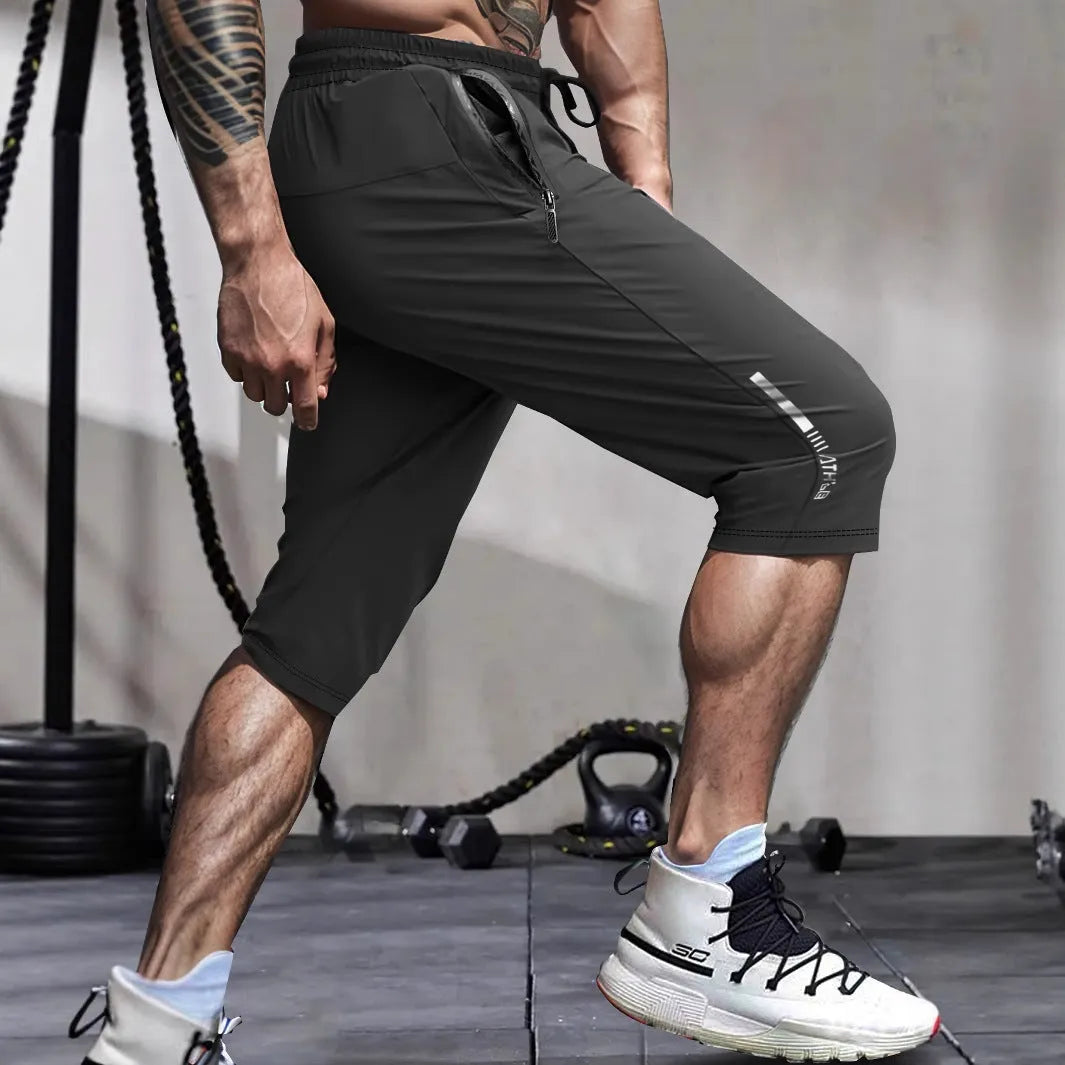 Men's cropped ice silk sports casual pants in black, blue, gray, or khaki colours