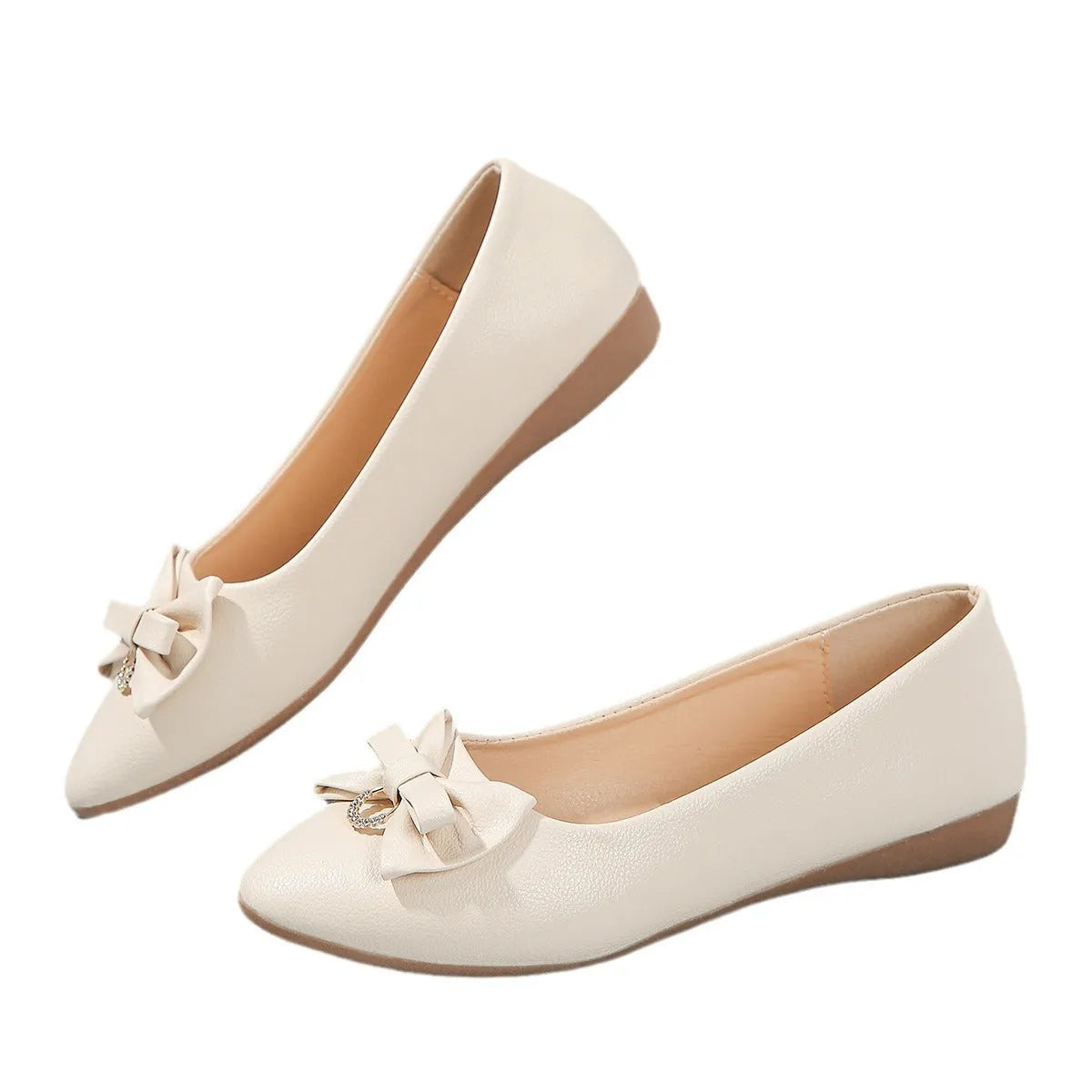 Women's beige flat casual slip-on shoes with a bowknot and shallow mouth design on a white background.