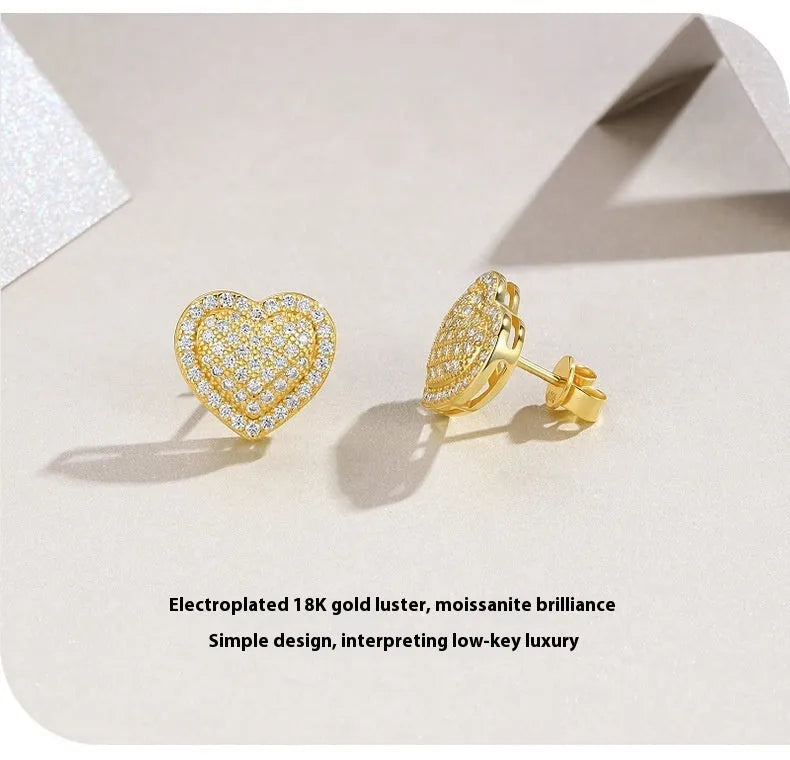 Gold plated heart shaped moissanite stud earrings with sterling silver posts